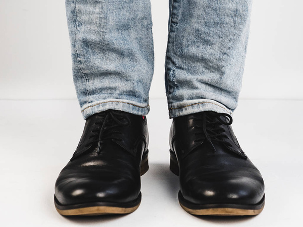 Male legs in black shoes - 写真・画像