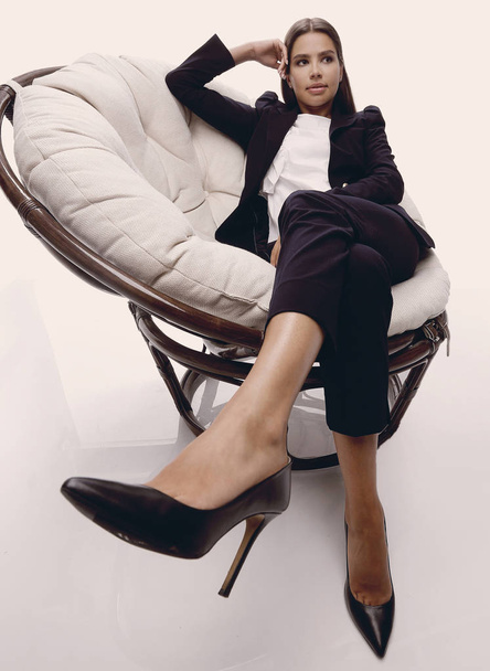business woman relaxarea in a comfortable chair - Zdjęcie, obraz