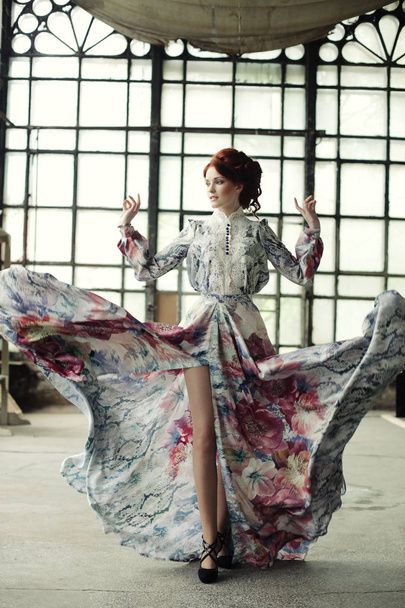 elegance woman with flying dress in palace room - Фото, зображення