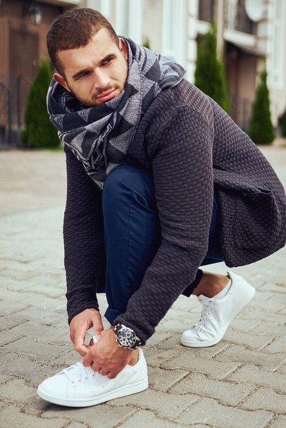 Portrait of a stylish guy, street fashion, lifestyle, clothing spring autumn - Фото, изображение