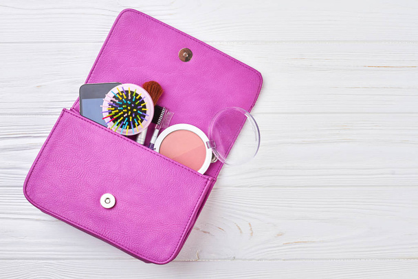 Female accessories in handbag, copy space. - Photo, Image