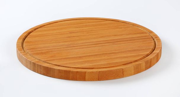Кругла дерев'яна обробна дошка
 - Фото, зображення