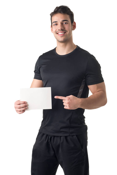 Entrenador personal sosteniendo una tarjeta vacía
 - Foto, imagen