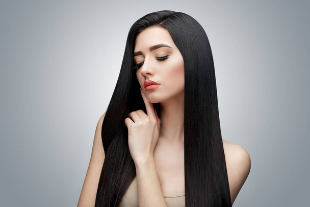 Brunette asian girl with long straight hair - Fotografie, Obrázek