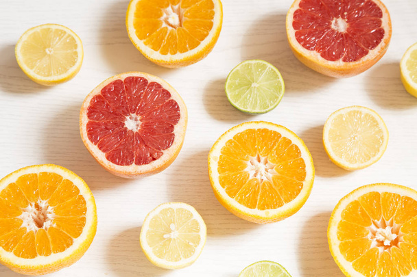 Orange and lemon halves - Φωτογραφία, εικόνα
