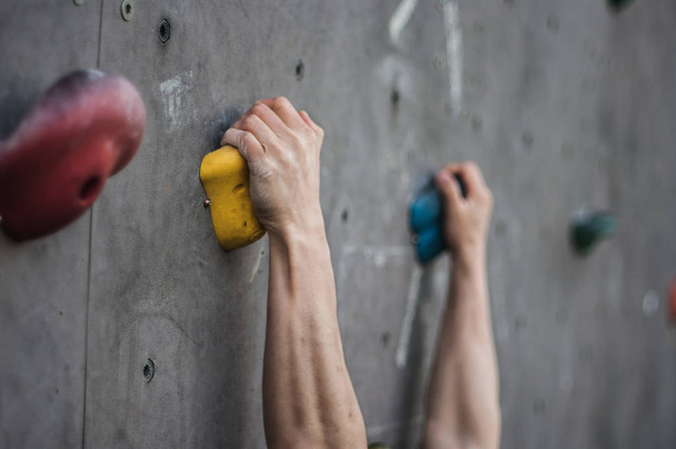 Close-up of asian male Climbing focus on hands - Φωτογραφία, εικόνα
