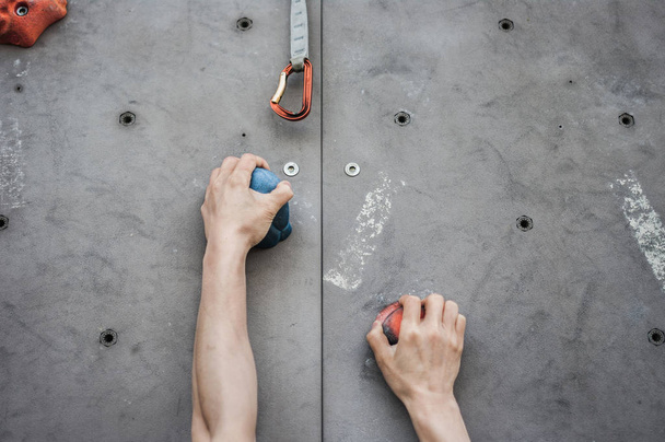 Close-up of asian male Climbing focus on hands - 写真・画像