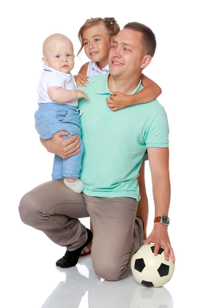 Happy dad with young children. - Fotoğraf, Görsel