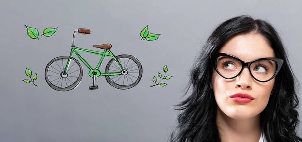 Eco Bicycle with young businesswoman - Zdjęcie, obraz