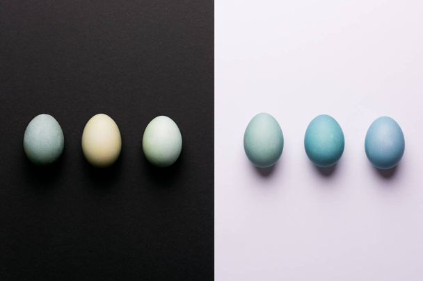 Happy Easter black and white background. Hand painted blue Easter eggs abstract minimal concept. - Fotoğraf, Görsel