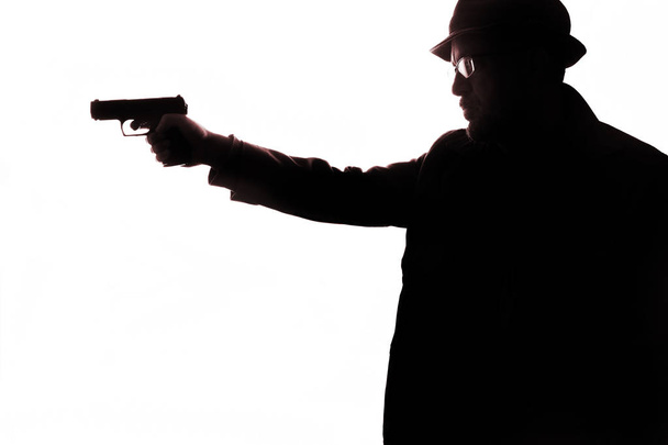  Mann mit Pistolensilhouette - Foto, Bild