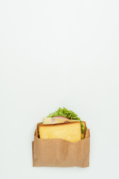 top view of sandwich in paper bag isolated on white - Photo, image