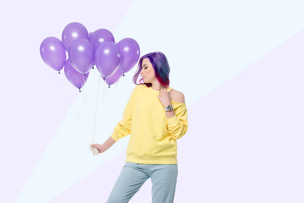 attractive young woman holding bunch of helium balloons on creative background - Foto, Imagen