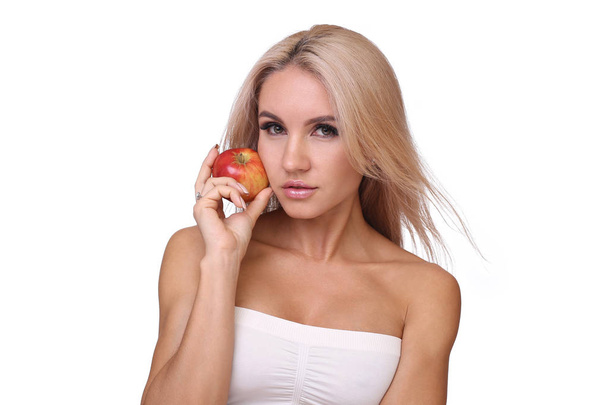 blond woman eat red apple - Foto, Imagem