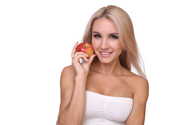 blond woman eat red apple - Фото, зображення