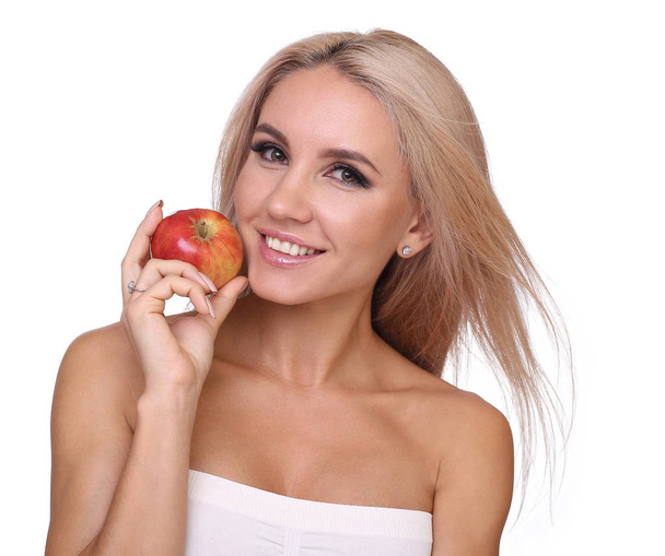 金髪の女性は、赤リンゴを食べる - 写真・画像