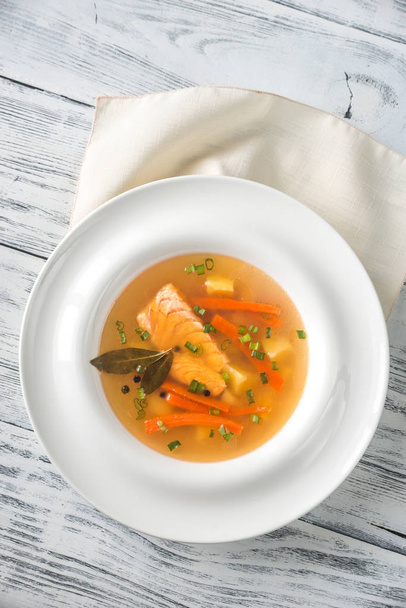Portion of salmon soup - Foto, afbeelding