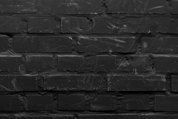 Brick wall painted in black color - Photo, Image