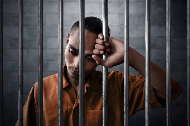 Asian man in prison - 写真・画像