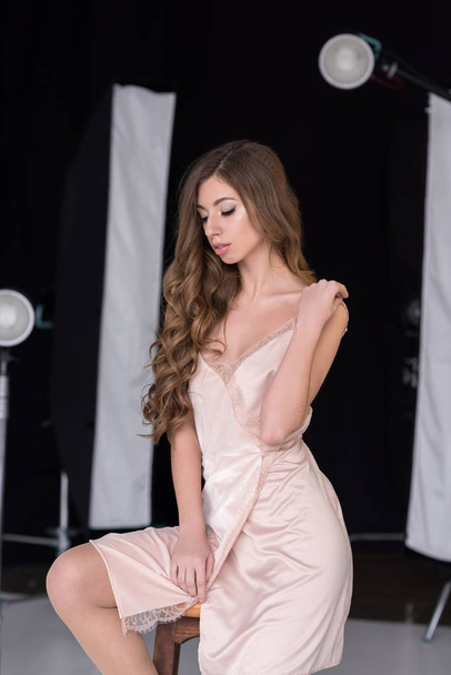 sensual girl with long hair posing for fashion shoot in studio - Fotoğraf, Görsel