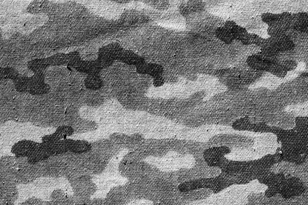 Weathered camouflage textile cloth in black and white. - Photo, Image