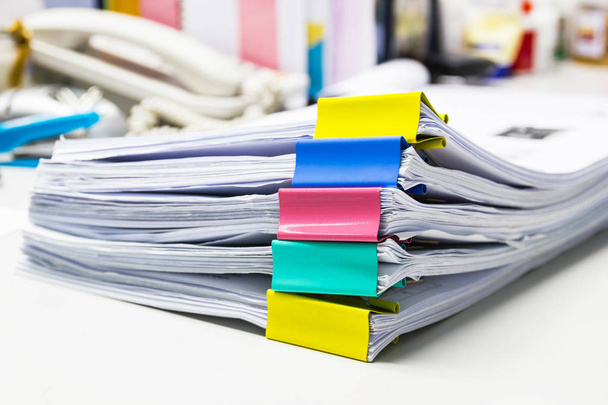Stack of papers documents in archives files with paper clips on desk at offices, business concept. - Φωτογραφία, εικόνα