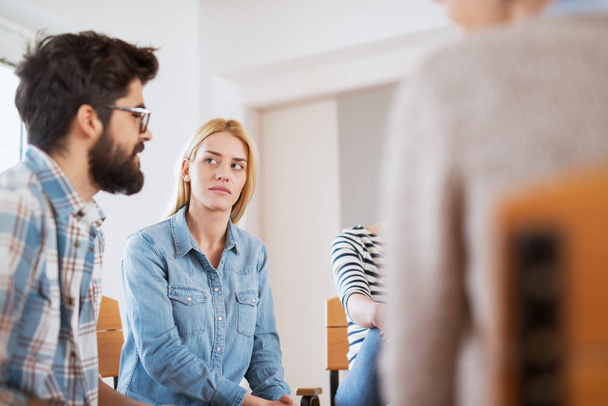 worried stressed woman listening patients on special group therapy - Photo, Image