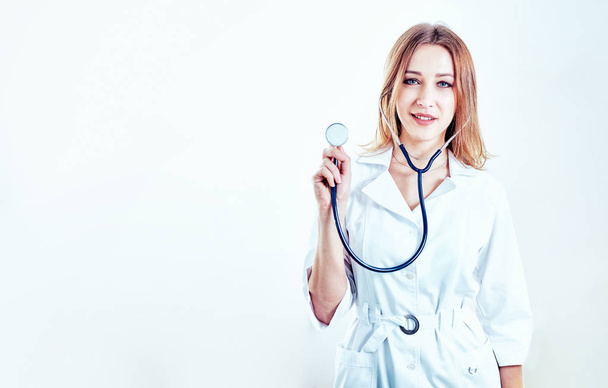 Close up of a nurse in front of a bright background - Photo, Image