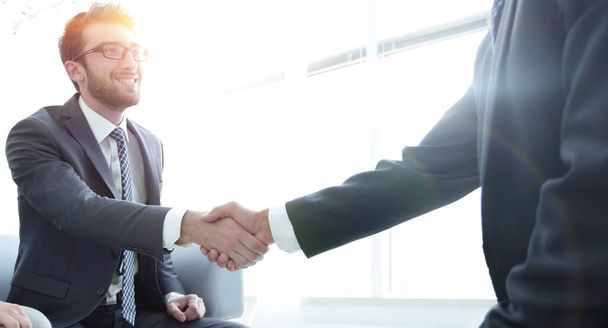 handshake business partners in the office - Photo, image