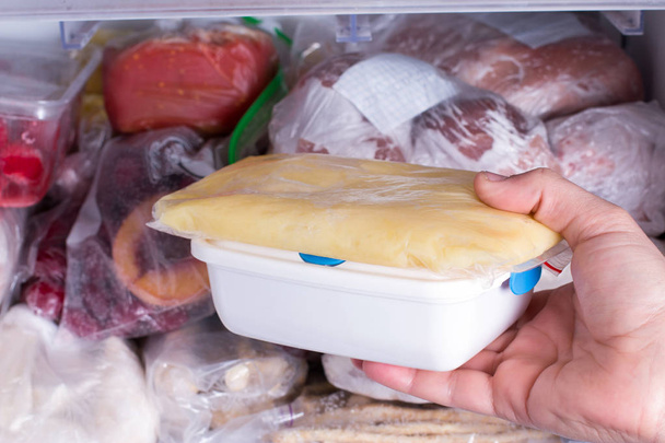 Mashed potatoes in a container in the freezer - Foto, Imagem