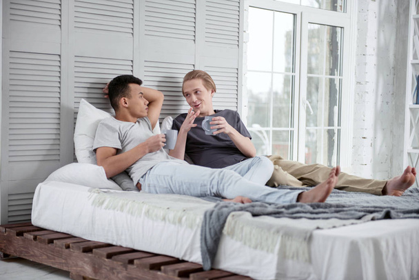 Creative gay couple talking about plans - Fotografie, Obrázek