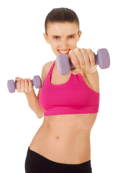 Young woman with hand weights - Photo, Image
