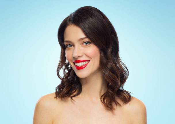 beautiful smiling young woman with red lipstick - 写真・画像