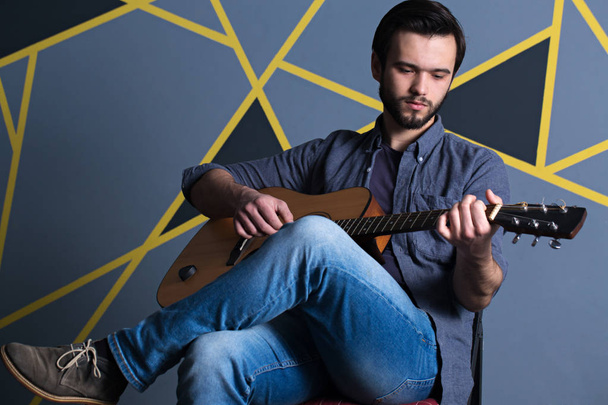 young man with guitar - Φωτογραφία, εικόνα