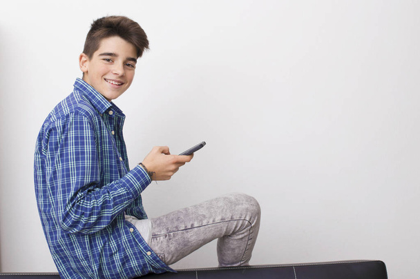 child, teenager or preteen with mobile phone - Foto, Imagem