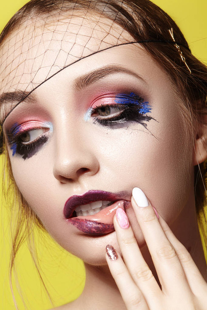 Dramatic Fashion Look young Woman. Beautiful Model with bright Make-up. Makeup style for Halloween - Foto, imagen