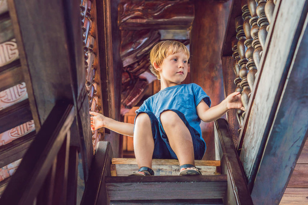 Boy tourist in Pagoda. Travel to Asia concept. Traveling with a baby concept. - 写真・画像