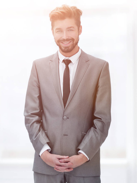 A young man in a gray suit - Foto, Imagen