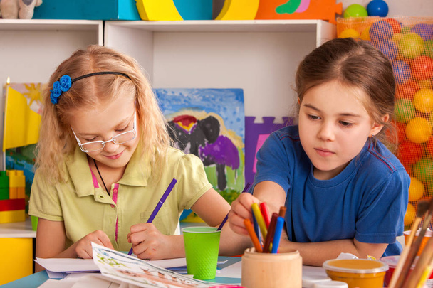 Small students children painting in art school class. - Φωτογραφία, εικόνα