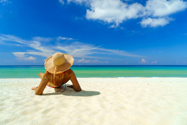 woman resting at the tropical beach resort - Фото, изображение