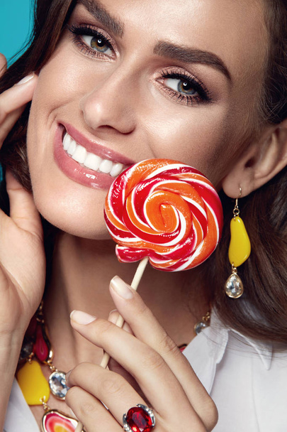 Beauty Makeup. Fashion Female Model With Candy - Photo, image