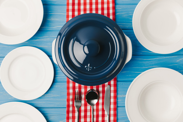 top view of served table with pan on blue table - Photo, image