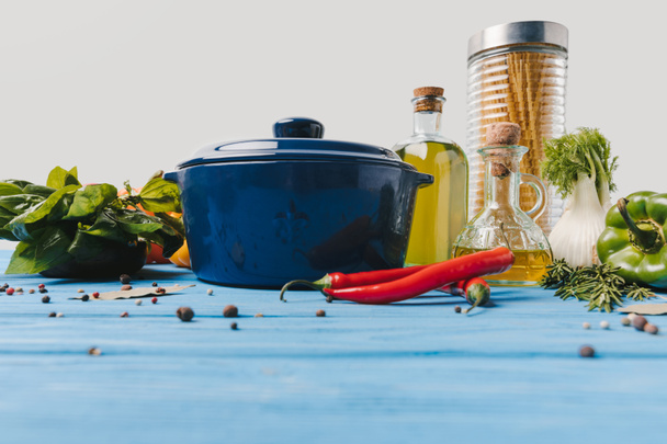 pan and ingredients for cooking pasta on table - Φωτογραφία, εικόνα