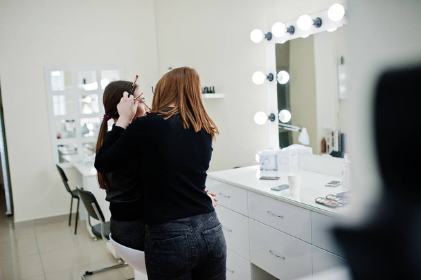 Make up artist work in her beauty visage studio salon. Woman app - Fotografie, Obrázek