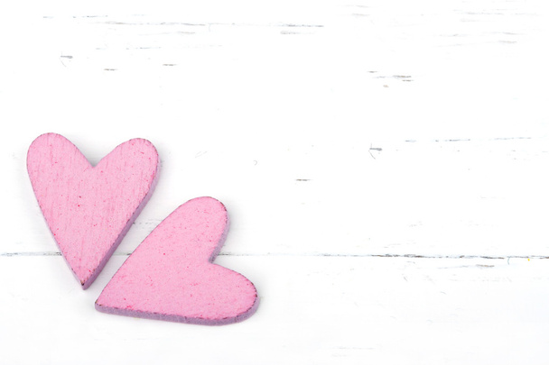 Two pink hearts on white background - Photo, Image