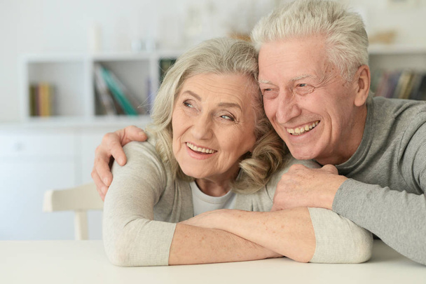 a happy senior couple posing   at home - Foto, afbeelding