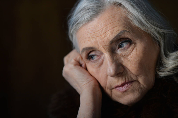 Close up portrait of tired senior woman posing - Fotografie, Obrázek