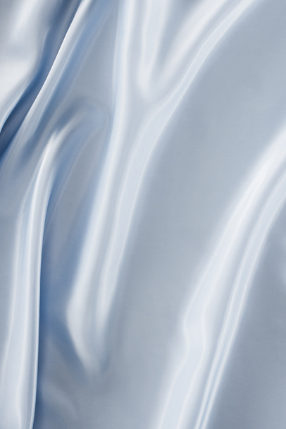 silver shiny satin fabric background - Foto, afbeelding