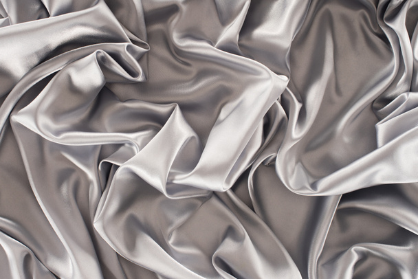 crumpled silver satin fabric background - Фото, зображення