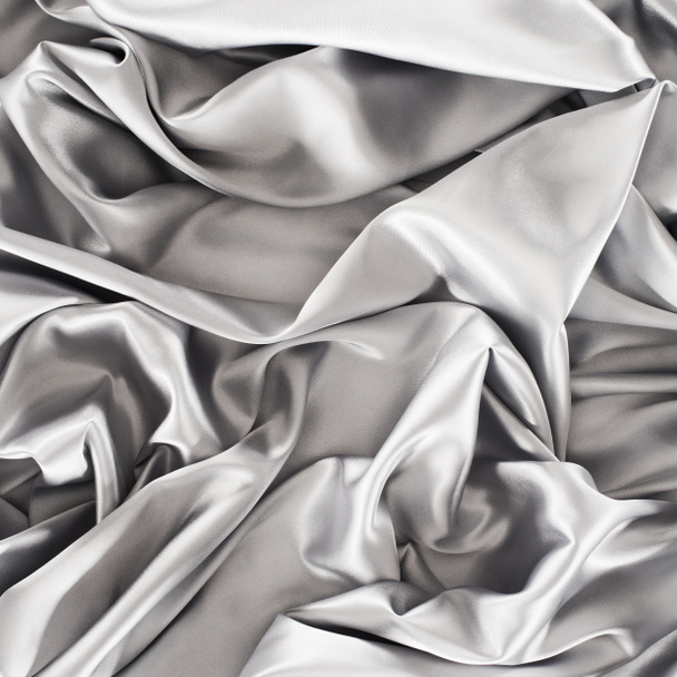 silver crumpled shiny silk fabric background - Фото, зображення
